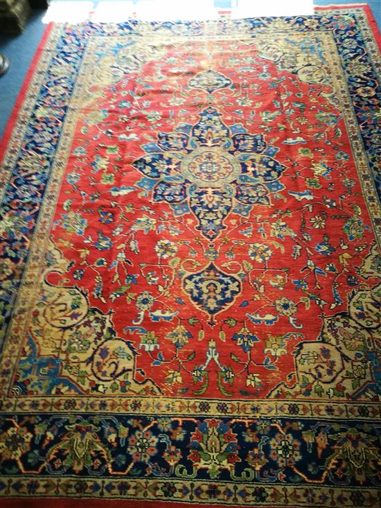 A Turkish carpet 330cm x 245cm